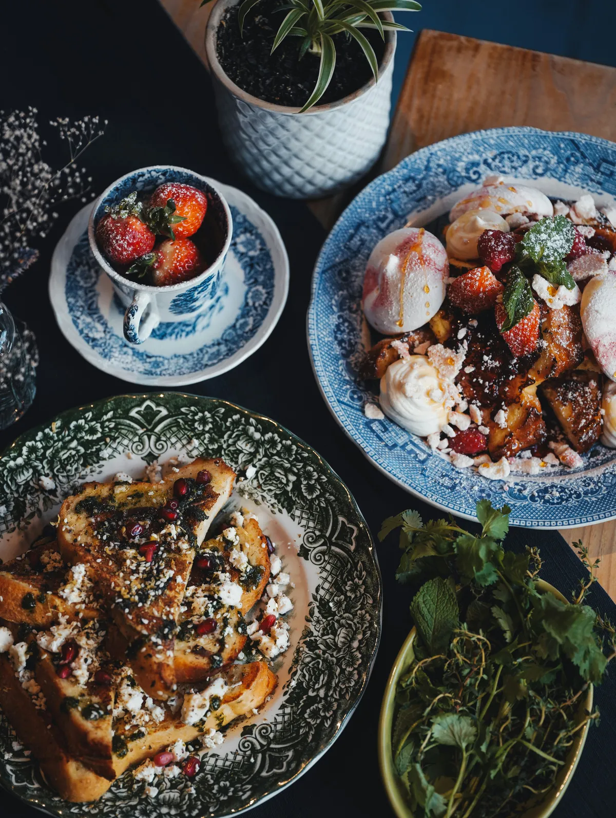 Dark Chocolate Tart with sea salt and crème fraîche plated on matte black stoneware at Risū & Oak